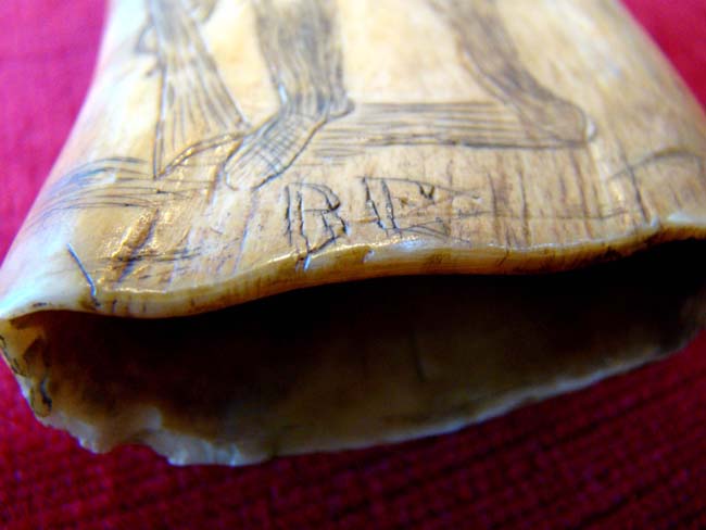 A 19th century Scrimshaw whale's tooth depicting a Frontiersman holding a Kentucky rifle circa 1858 — image 3